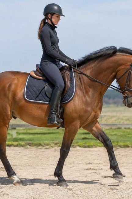 Georgette équitation : causes, conséquences et solutions pour améliorer sa position à cheval